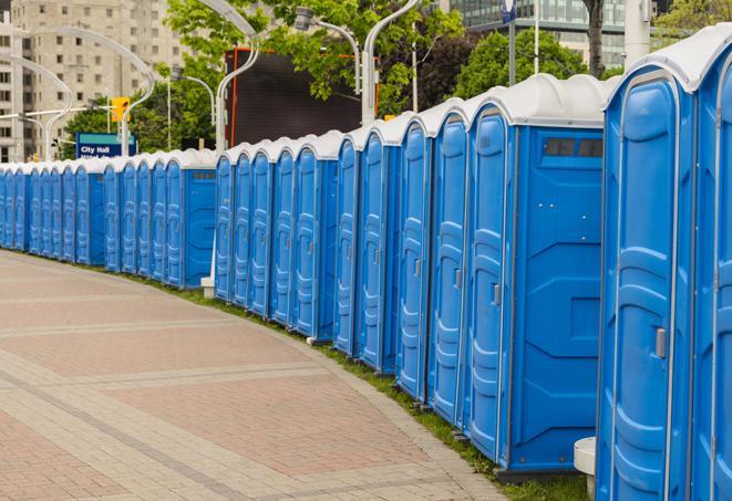 outdoor restroom setup for a special event, with sleek and modern portable restrooms in Encinal